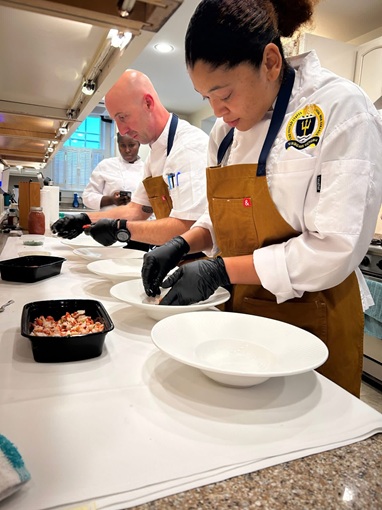 Two chefs cooking